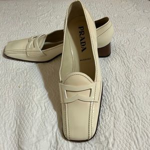 Prada Ivory Patent Loafers